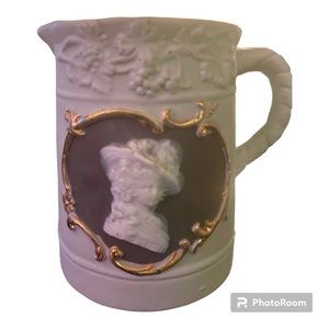 Schafer & Vater green jasperware creamer w/ cameo detail on front - German stamp